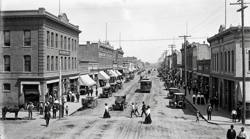 Early 1900s downtown Modesto California with historic buildings and automobiles